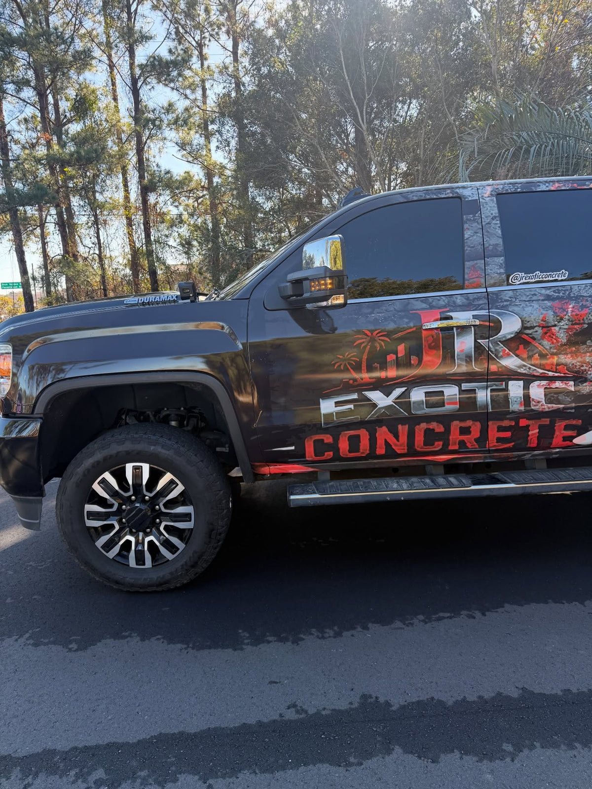 Custom business wrap on a GMC Sierra for a concrete company, designed and printed by Jay's Car Designs