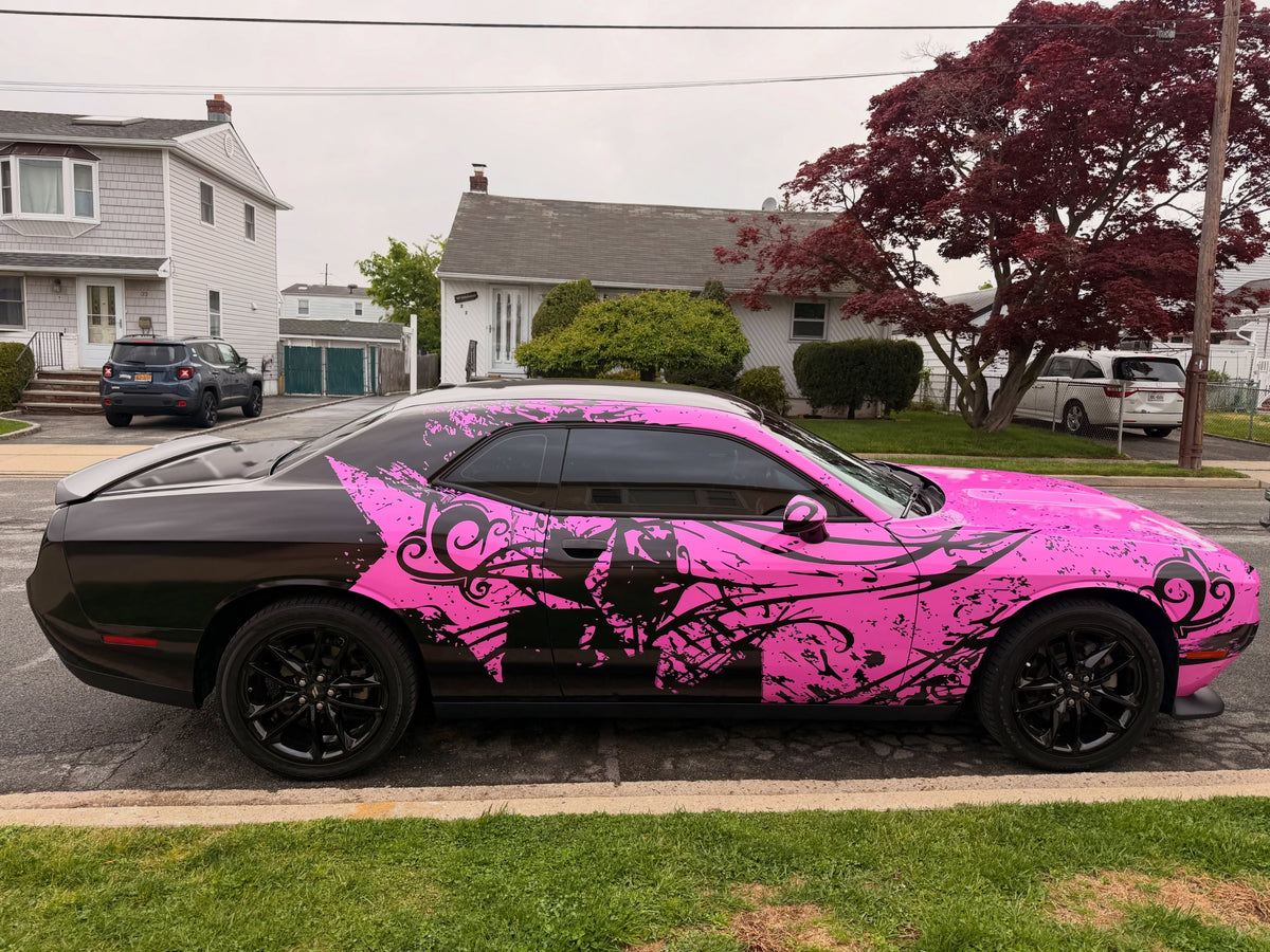 Side profile of a pink flower-star full wrap on a Dodge Challenger, designed by Jay's Car Designs